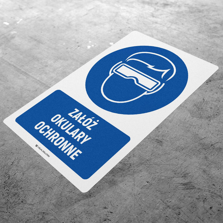 Naklejka podłogowa BHP: Nakaz noszenia okularów ochronnych z opisem.