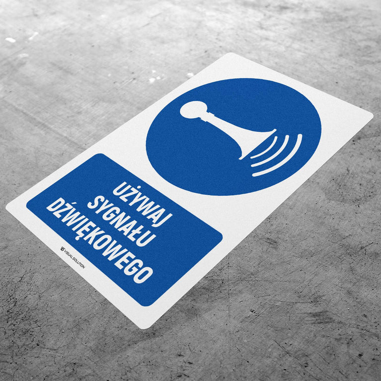 Naklejka podłogowa BHP: Nakaz używania sygnału dźwiękowego z opisem.