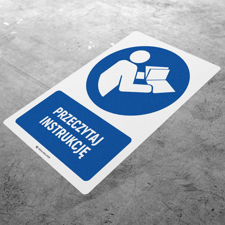 Naklejka podłogowa BHP: Nakaz przeczytania instrukcji z opisem.
