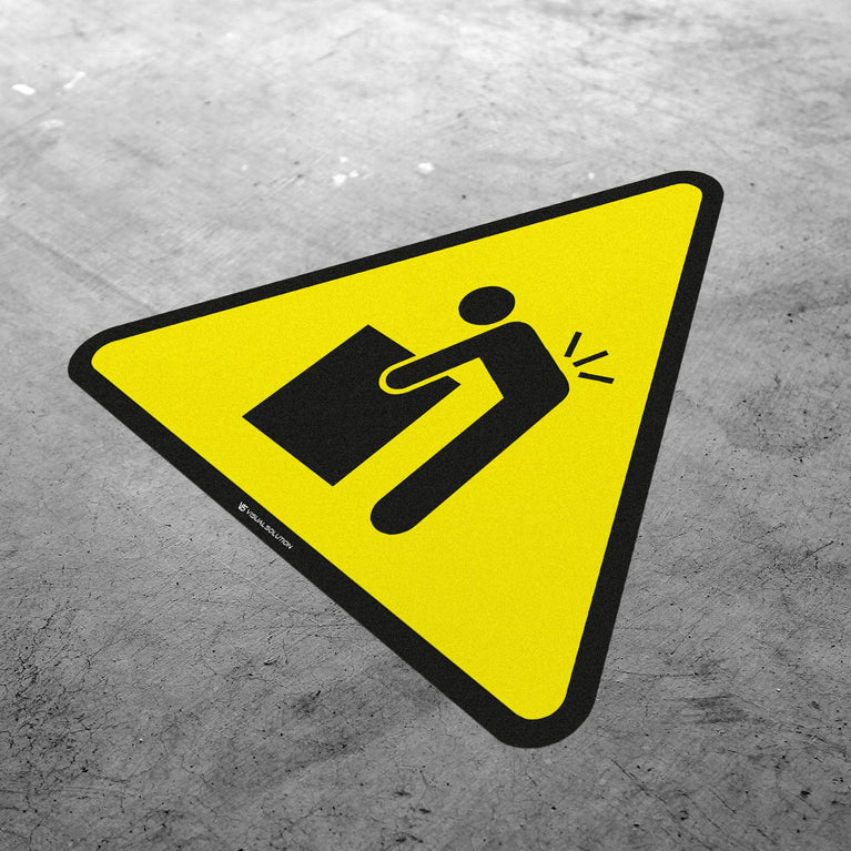 Naklejka ostrzegawcza dotycząca ciężkiego przedmiotu.