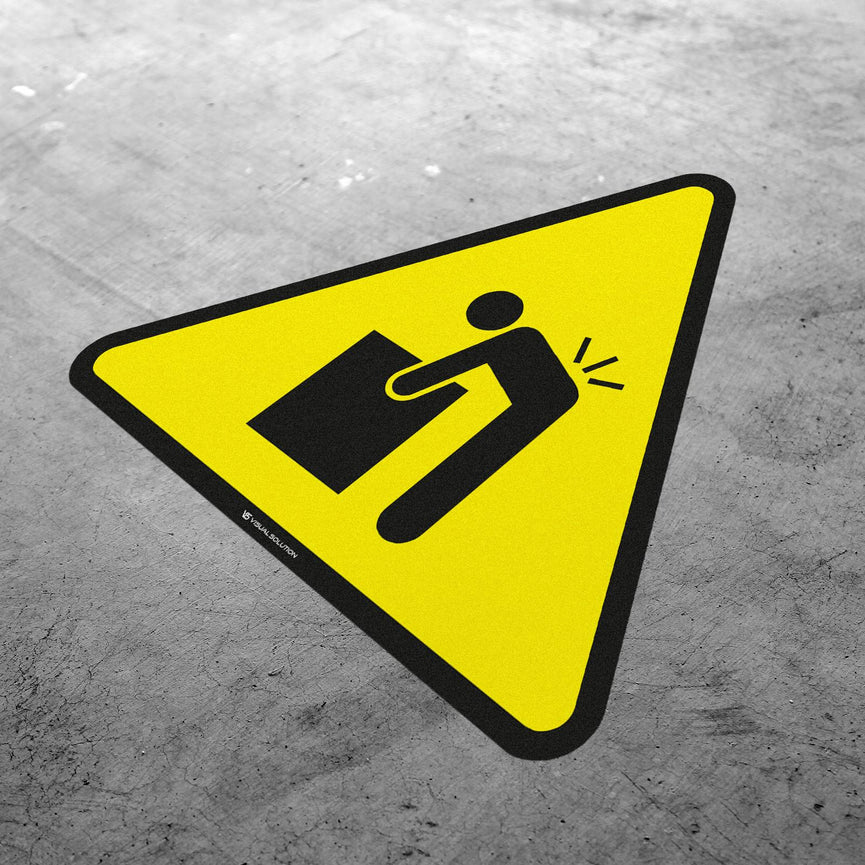 Naklejka ostrzegawcza dotycząca ciężkiego przedmiotu.