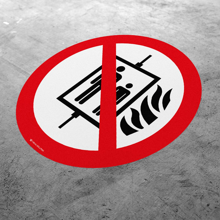 Naklejka Podłogowa BHP: Zakaz Używania Windy w Razie Pożaru