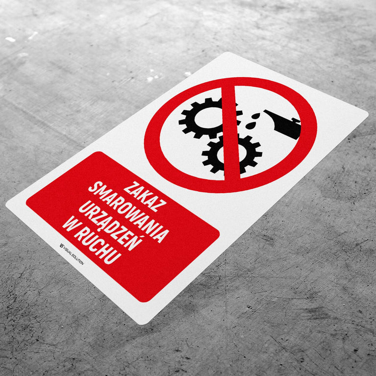 Naklejka Podłogowa BHP: Znak "Zakaz Smarowania Urządzeń w Ruchu" z Opisem