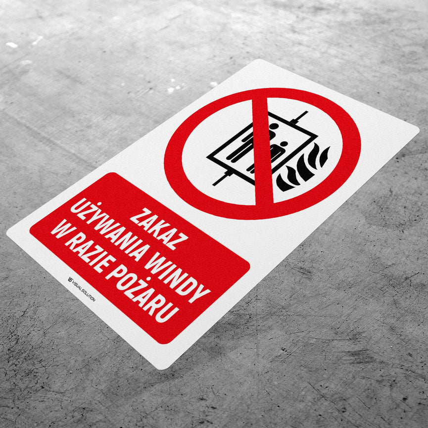 Naklejka Podłogowa BHP: Znak "Zakaz Używania Windy w Razie Pożaru" z Opisem