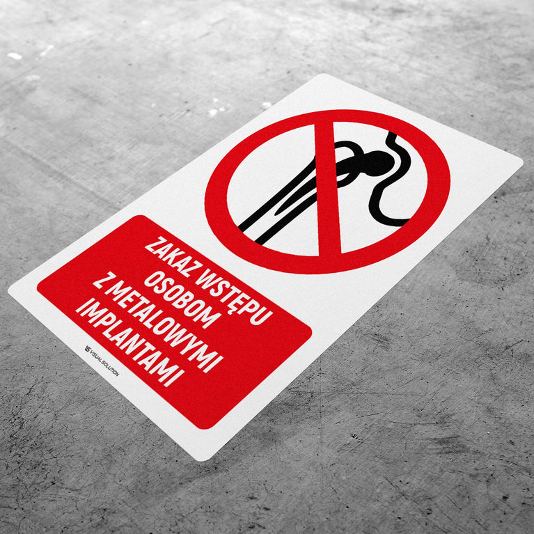 Naklejka Podłogowa BHP: Znak "Zakaz Wstępu Osobom z Metalowymi Implantami" z Opisem